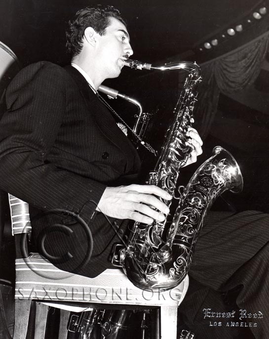 Bus Bassey, featured tenor sax with Artie Shaw, enjoys the distinction of owning the first "padless" saxophone sold anywhere in the United States